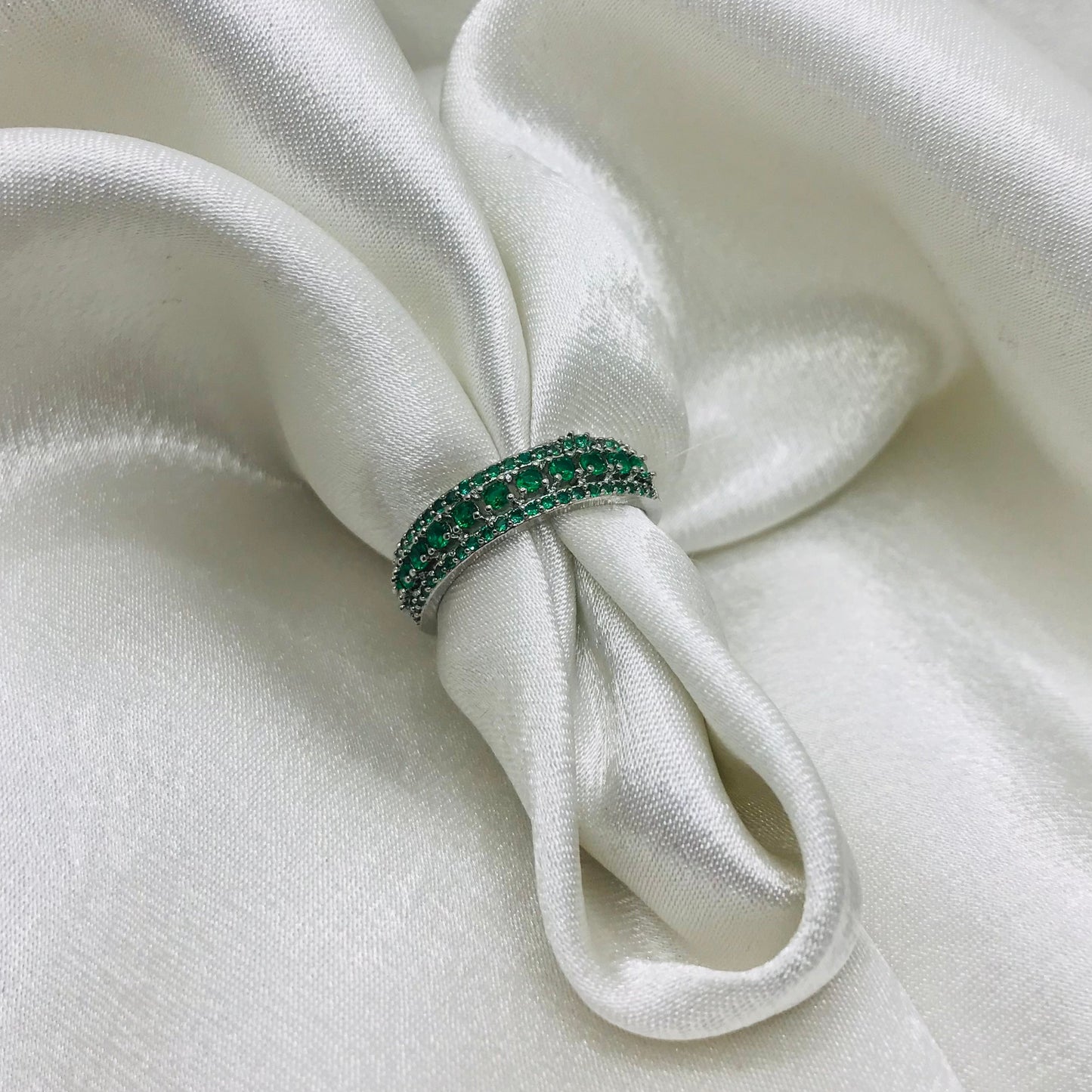 Eternity Ring with Green Gemstones