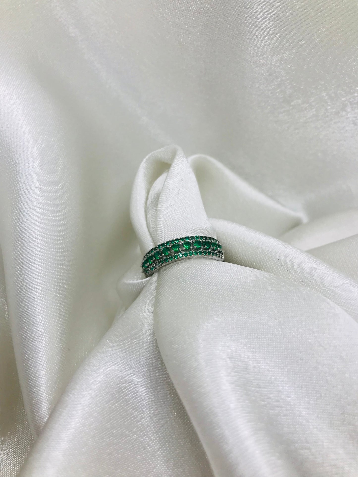 Eternity Ring with Green Gemstones