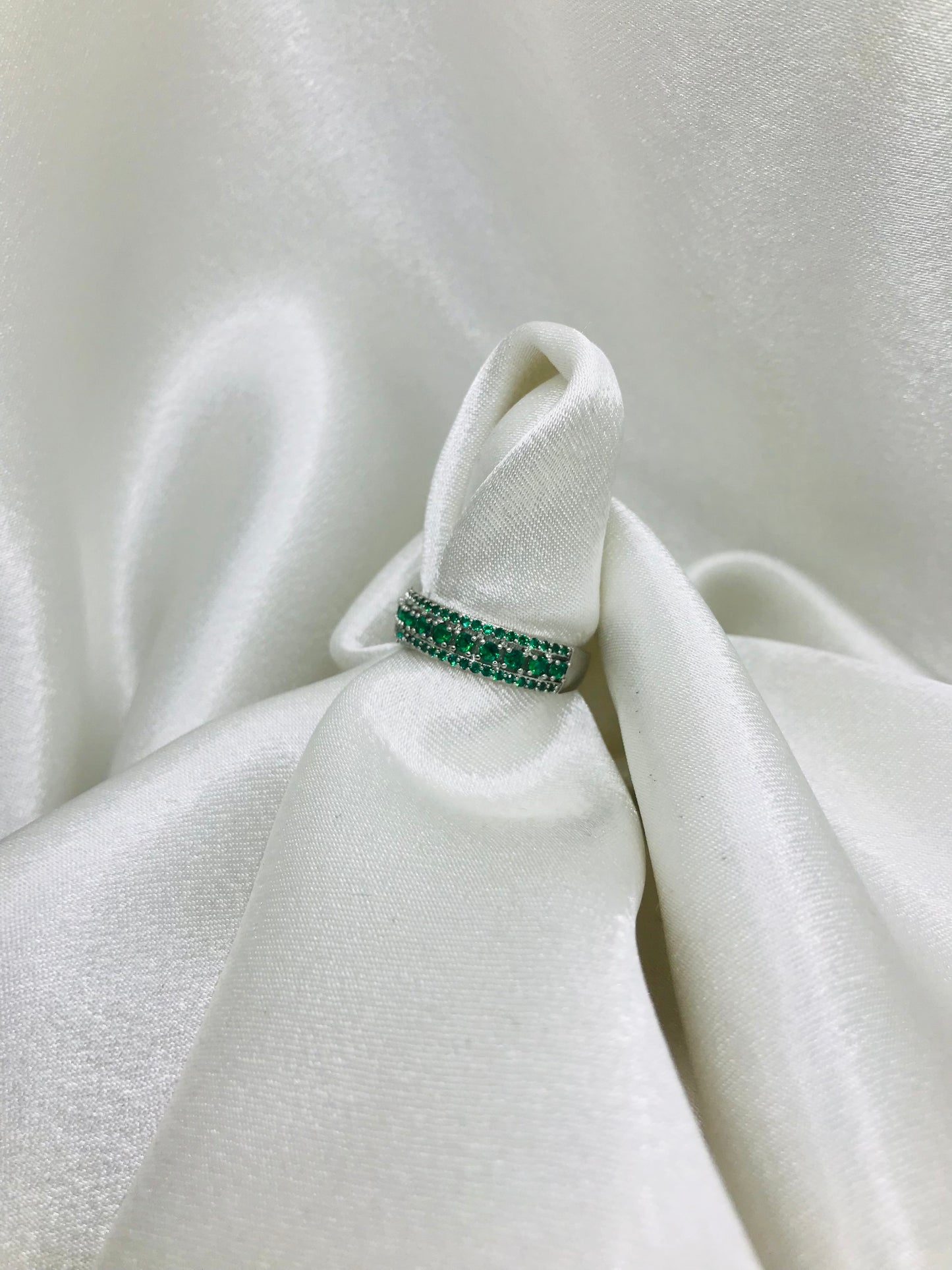 Eternity Ring with Green Gemstones