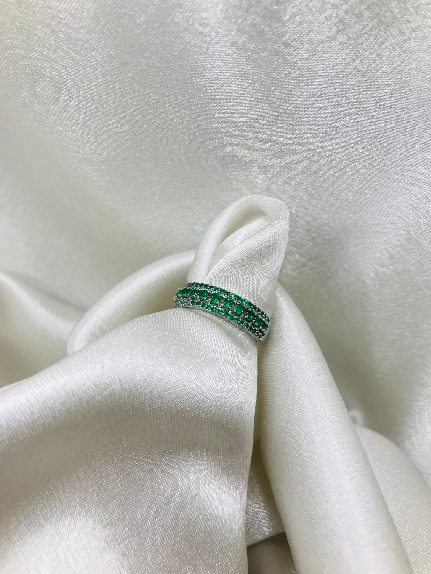 Eternity Ring with Green Gemstones