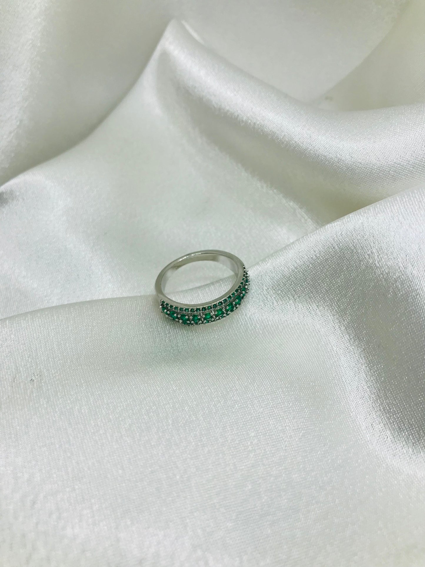 Eternity Ring with Green Gemstones
