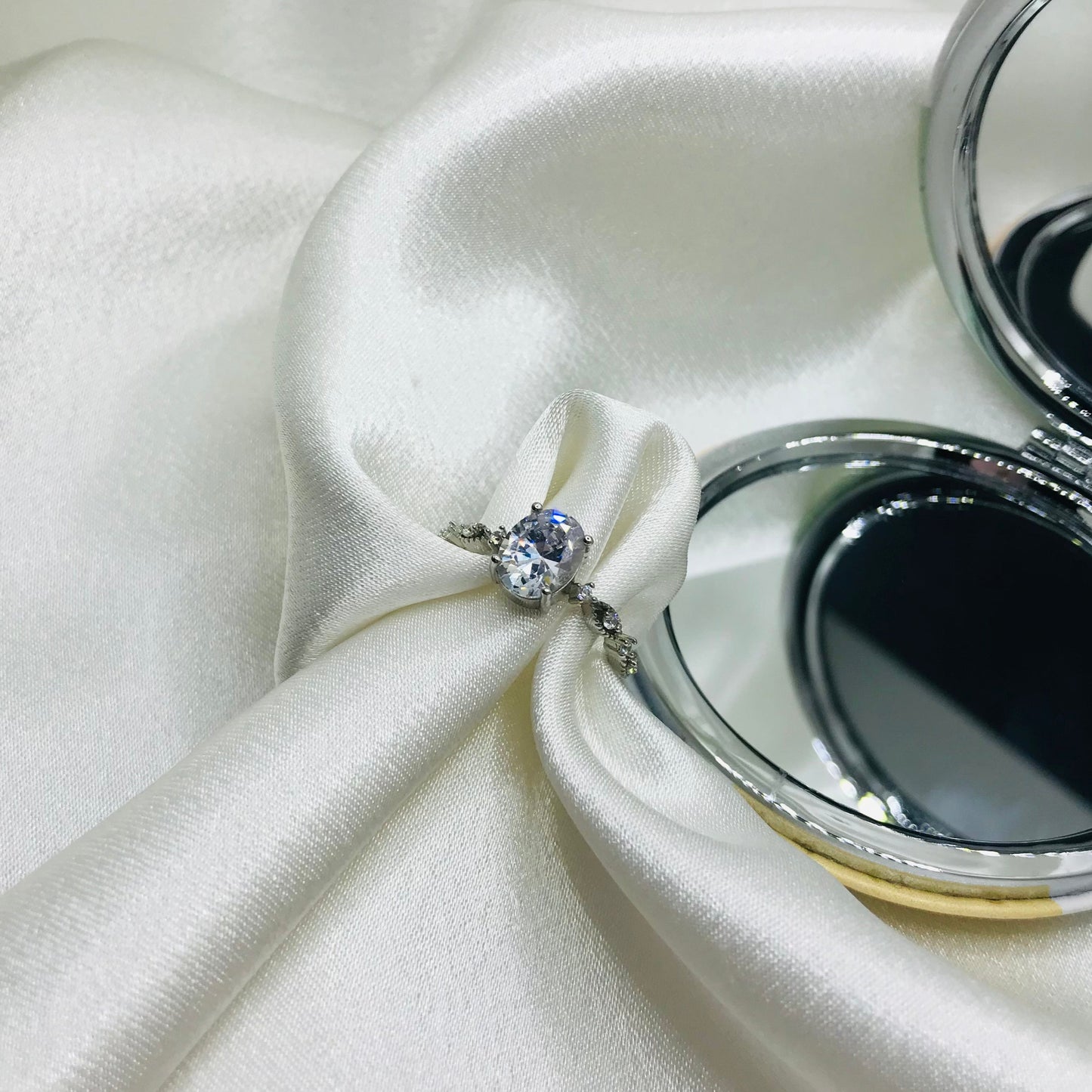 Twisted Silver Ring with Diamonds