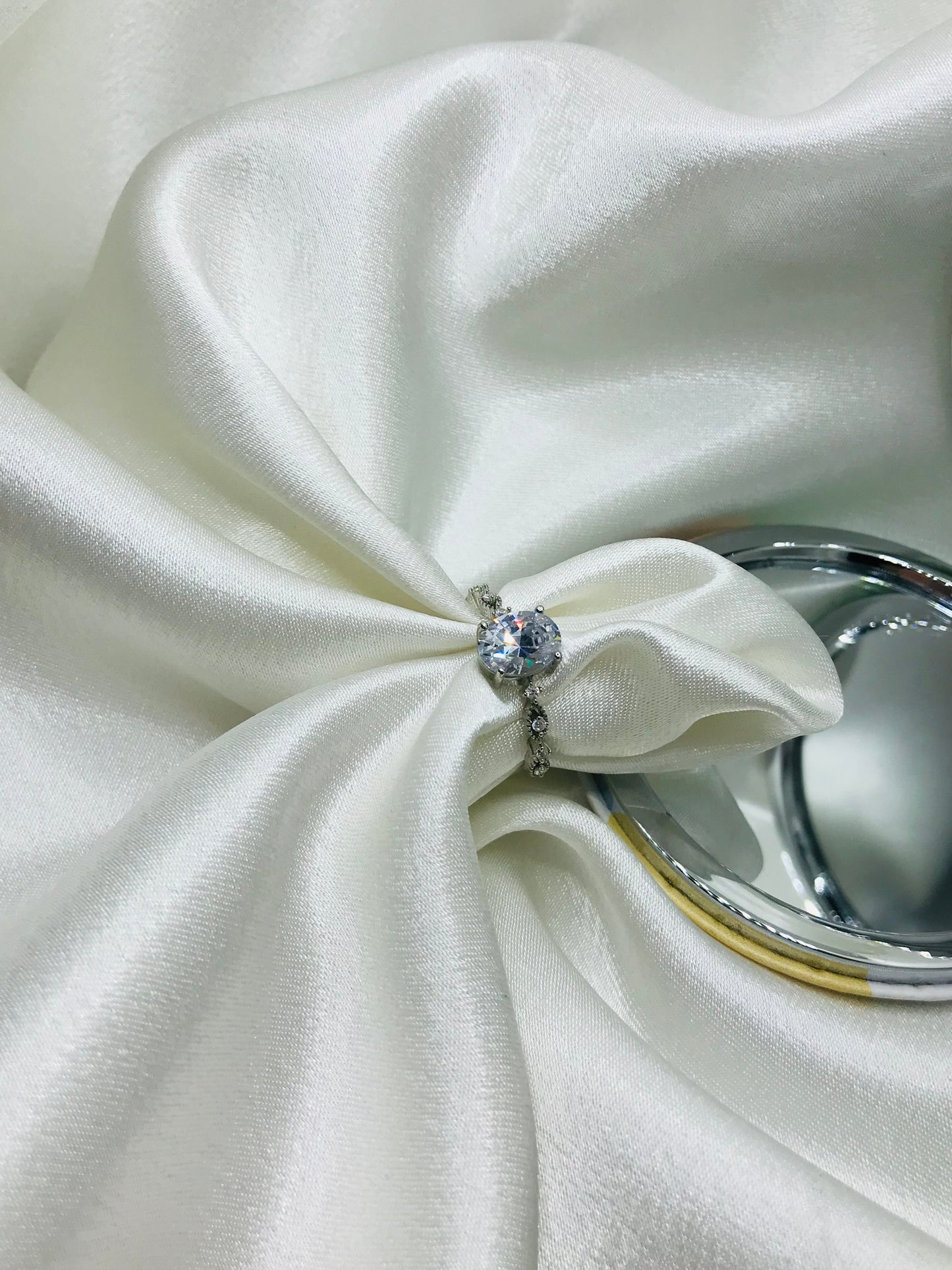 Twisted Silver Ring with Diamonds