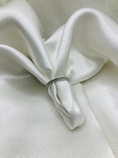 Eternity Ring with Green Gemstones